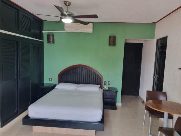 Suites Los Arcos : photo 2 de la chambre chambre lit king-size