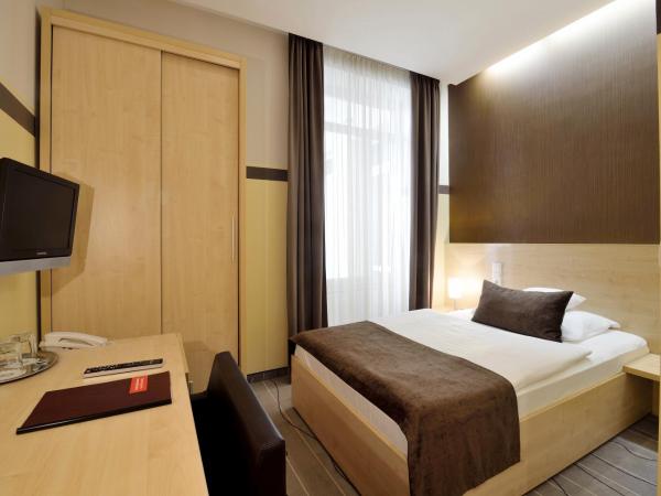 Promenade City Hotel : photo 1 de la chambre chambre simple