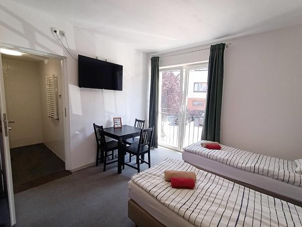 Firstroom Gdańsk : photo 4 de la chambre chambre quadruple avec salle de bains