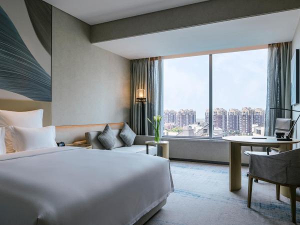 Pullman Shanghai Qingpu Excellence : photo 4 de la chambre chambre lit king-size de luxe - vue sur ville - Étage supérieur
