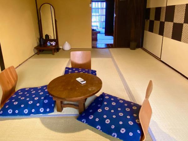 Guesthouse Kioto : photo 6 de la chambre chambre lits jumeaux supérieure - vue sur jardin