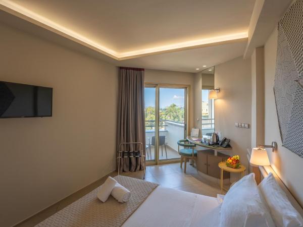 Emmantina Hotel : photo 7 de la chambre chambres doubles ou lits jumeaux communicantes - vue latérale sur mer