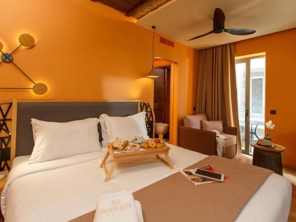 Palmera Beach Hotel & Spa - Adults Only : photo 6 de la chambre suite supérieure deluxe avec hammam et jacuzzi