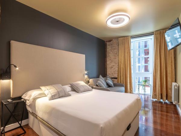 Victorooms : photo 3 de la chambre chambre triple - vue sur extérieur