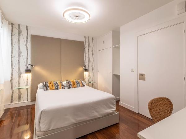 Victorooms : photo 3 de la chambre chambre double - vue sur patio