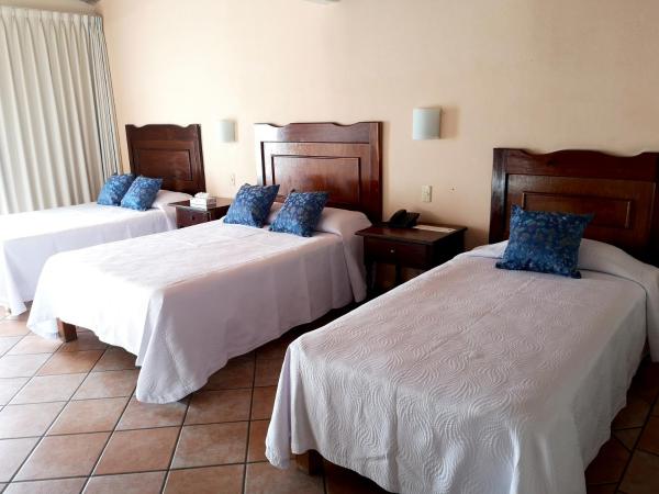 Hotel El Pescador : photo 3 de la chambre chambre familiale standard