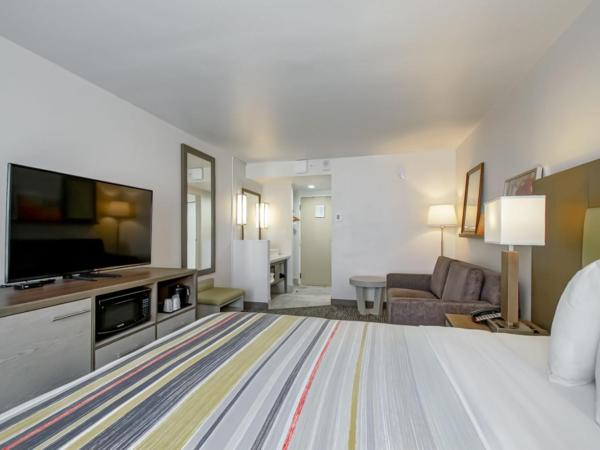 Country Inn & Suites by Radisson, New Orleans I-10 East, LA : photo 3 de la chambre suite 1 chambre lit king-size - non-fumeurs