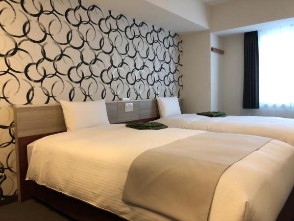 Kuretake Inn Premium Meieki minami : photo 1 de la chambre chambre lits jumeaux - fumeurs