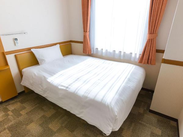 Toyoko Inn Shin-Osaka Chuo-guchi Shinkan : photo 2 de la chambre chambre double pour occupation simple - fumeurs