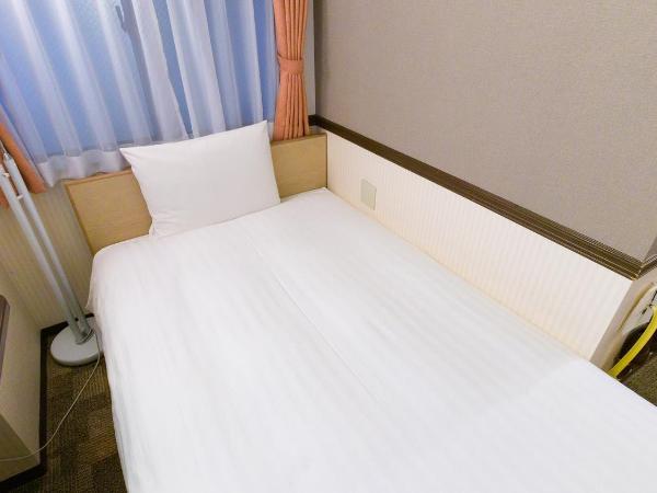 Toyoko Inn Shin-Osaka Chuo-guchi Honkan : photo 4 de la chambre chambre lits jumeaux - fumeurs