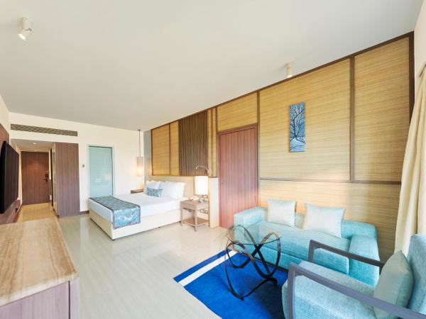 The Resort : photo 8 de la chambre hébergement de luxe - vue sur jardin