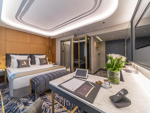 Altinel Ankara Hotel & Convention Center : photo 4 de la chambre chambre deluxe double ou lits jumeaux