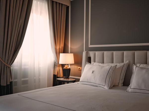 GA Palace Hotel & Spa, a XIXth-Century Villa : photo 5 de la chambre chambre double ou lits jumeaux exécutive prestige