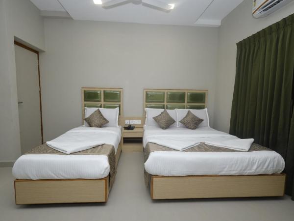 Grand Courtyard Business Hotel : photo 1 de la chambre chambre triple deluxe