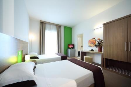 Hotel Trieste : photo 2 de la chambre chambre quadruple deluxe