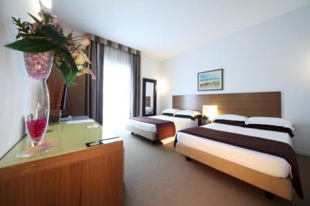 Hotel Trieste : photo 4 de la chambre chambre quadruple deluxe
