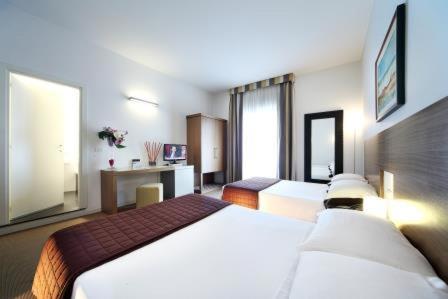 Hotel Trieste : photo 7 de la chambre chambre quadruple deluxe
