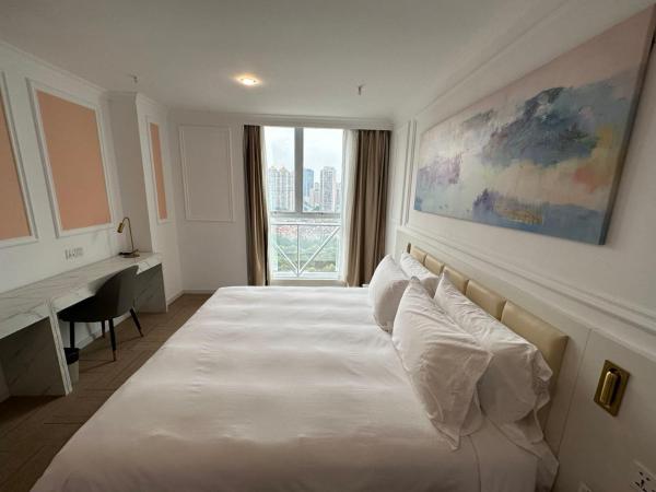 Magnificent International Hotel : photo 7 de la chambre chambre lit queen-size deluxe