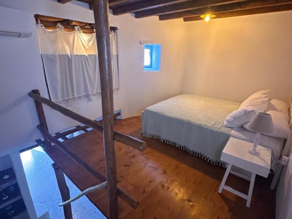 Rizes Mykonos - Folklore Farmstead : photo 1 de la chambre chambre quadruple Économique avec salle de bains commune