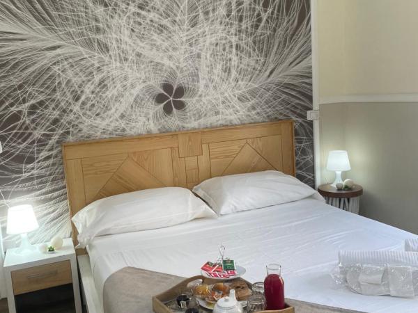 Parthenope Rooms : photo 7 de la chambre chambre quadruple de luxe