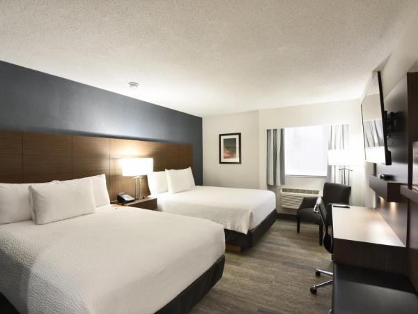 Victoria Inn Hotel and Convention Center Winnipeg : photo 7 de la chambre chambre lit queen-size affaires - Étage affaires