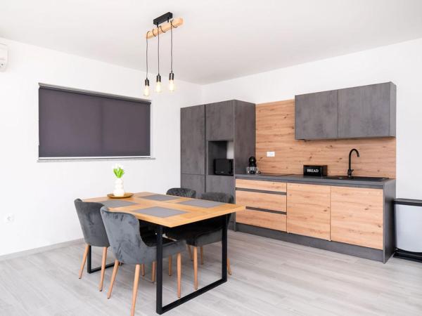 Apartments Grubišić - Šibenik - parking included : photo 1 de la chambre appartement deluxe