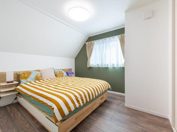 Ici Japon Village : photo 4 de la chambre chambre lit queen-size avec salle de bains commune 