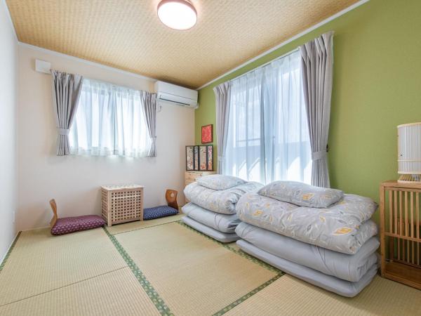 Ici Japon Village : photo 6 de la chambre chambre lits jumeaux avec salle de bains commune