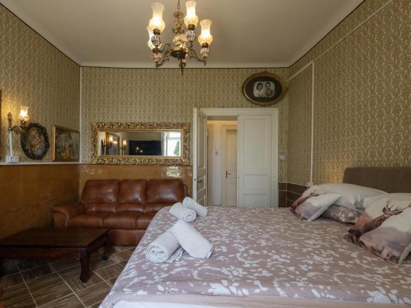 Garden Apartment Marina : photo 10 de la chambre appartement - vue sur jardin