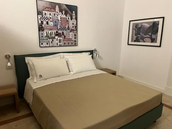 VIANNA SUITES SPA : photo 1 de la chambre chambre lit king-size deluxe