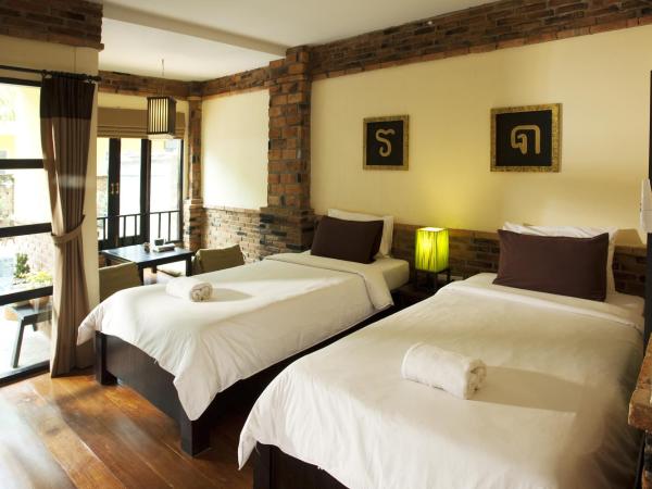 Motive Cottage Resort : photo 1 de la chambre chambre lits jumeaux deluxe