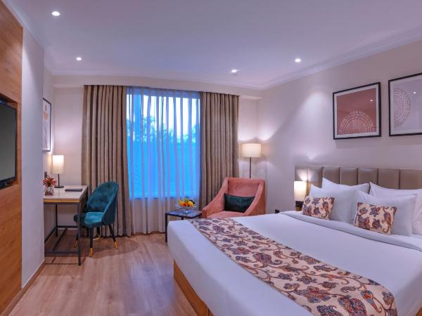 Royale Sarovar Portico Agra : photo 2 de la chambre chambre deluxe 1 lit double
