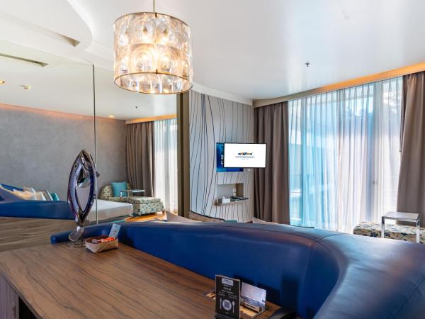 Hotel Baraquda Heeton Pattaya by Compass Hospitality : photo 4 de la chambre chambre lit king-size deluxe