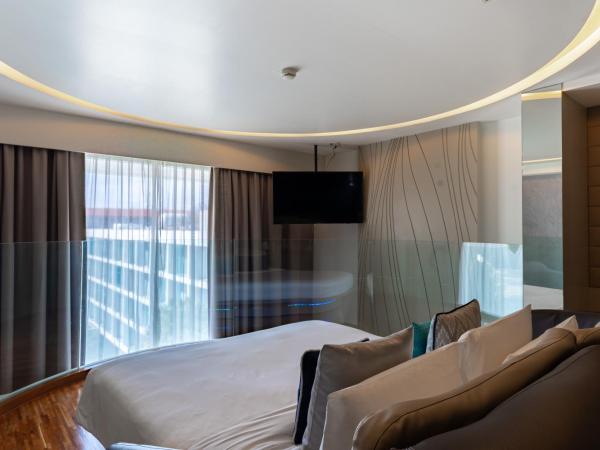 Hotel Baraquda Heeton Pattaya by Compass Hospitality : photo 7 de la chambre suite en duplex