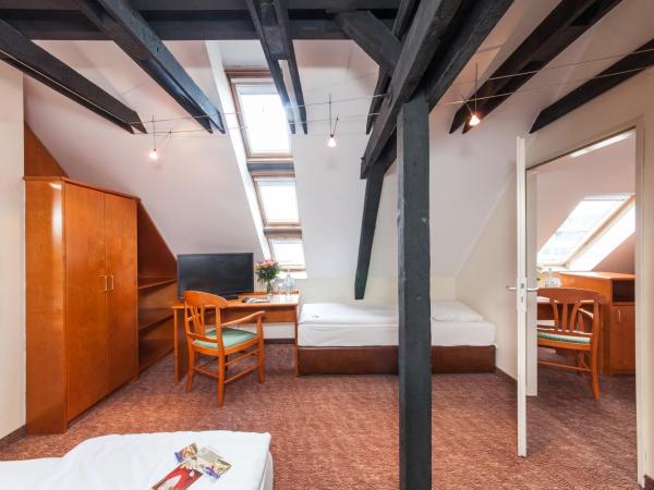 Hotel Ahl Meerkatzen : photo 9 de la chambre chambre quadruple