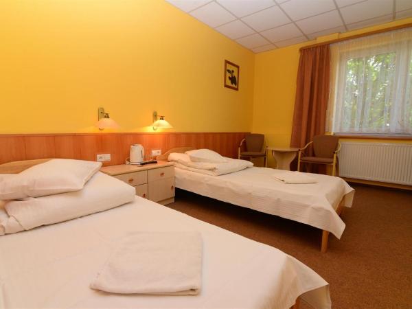 Ośrodek SCSK Optima : photo 5 de la chambre chambre lits jumeaux supérieure