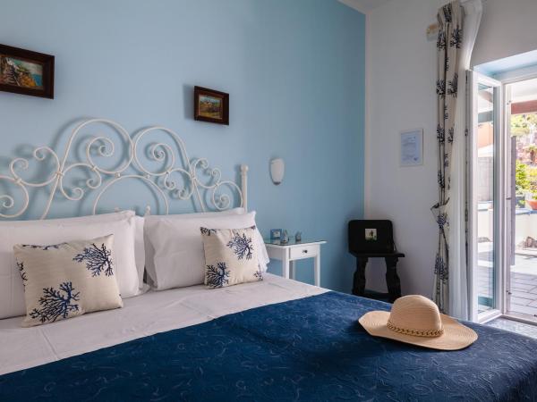 BnB Le Isole : photo 3 de la chambre chambre double ou lits jumeaux - vue sur jardin