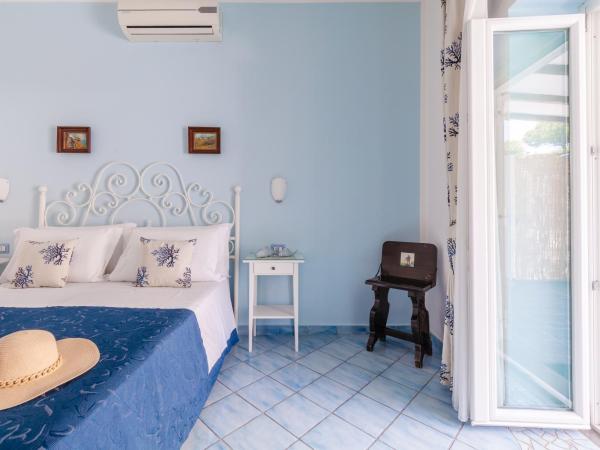 BnB Le Isole : photo 5 de la chambre chambre double ou lits jumeaux - vue sur jardin