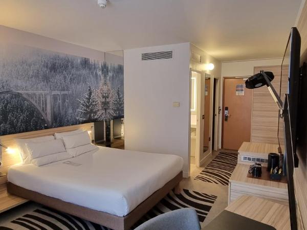 Novotel Leeds Centre : photo 3 de la chambre chambre lit queen-size et canapé