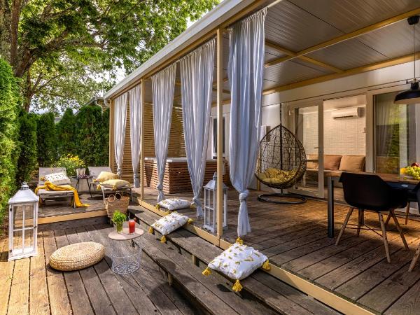 Polidor Camping Resort : photo 1 de la chambre mobile home 2 chambres deluxe avec jacuzzi