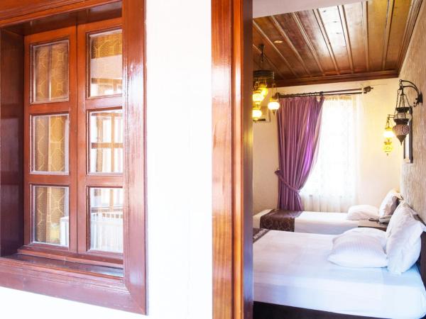 Cicerone Lodge Hotel : photo 3 de la chambre chambre triple standard