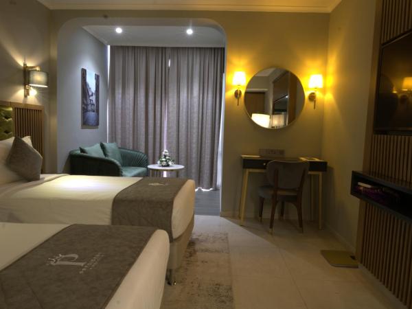 President Hotel : photo 3 de la chambre chambre lits jumeaux deluxe