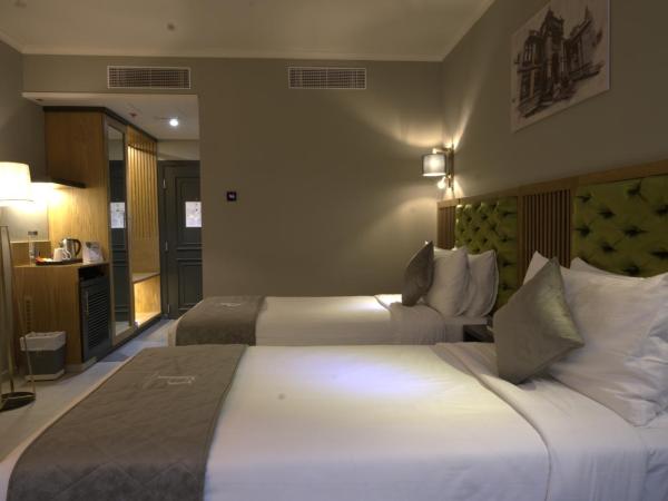 President Hotel : photo 7 de la chambre chambre lits jumeaux deluxe