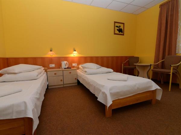 Ośrodek SCSK Optima : photo 7 de la chambre chambre lits jumeaux supérieure