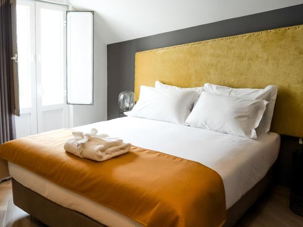 Guest House Jacarandá Faro : photo 9 de la chambre chambre deluxe