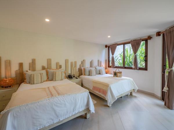 Ana y Jose Hotel & Beach Club Tulum : photo 6 de la chambre suite 2 chambres