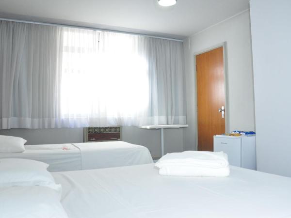 Rede Andrade San Martin : photo 2 de la chambre chambre triple standard avec 1 lit double et 1 lit simple