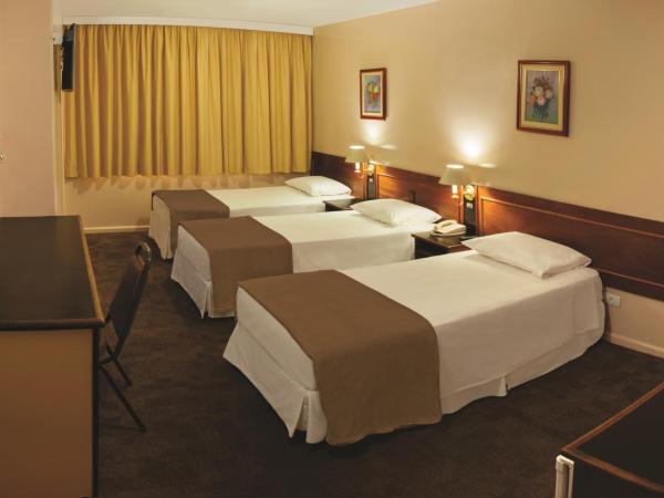 Lira Hotel : photo 2 de la chambre chambre triple supérieure avec 3 lits simples 