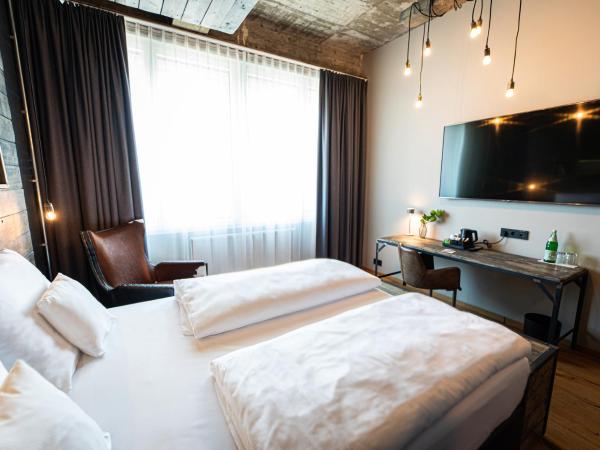 LOFTSTYLE Hotel Hannover, Best Western Signature Collection : photo 2 de la chambre chambre affaires avec lit queen-size et vue
