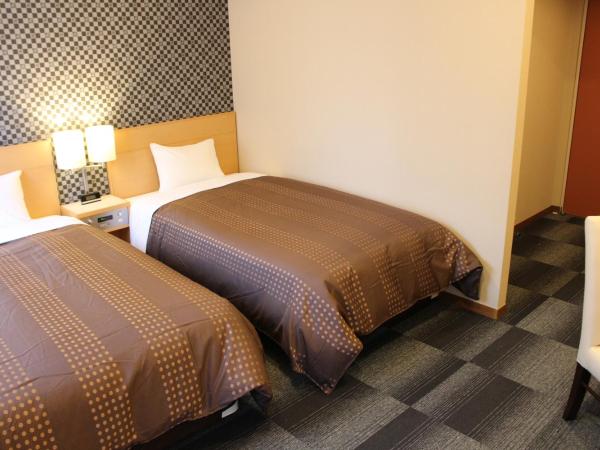 HOTEL LiVEMAX BUDGET Chiba Mihama : photo 4 de la chambre chambre lits jumeaux - non-fumeurs